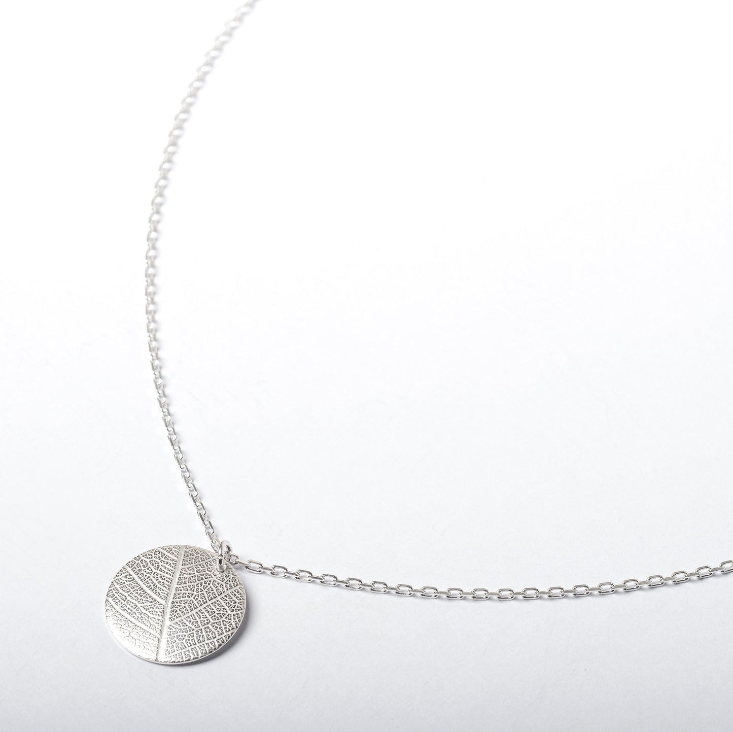 Textured medallion necklace